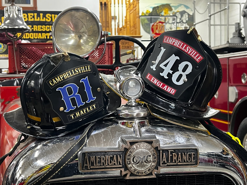 Two Box 31 shields on Campbellsville's antique American LaFrance engine
